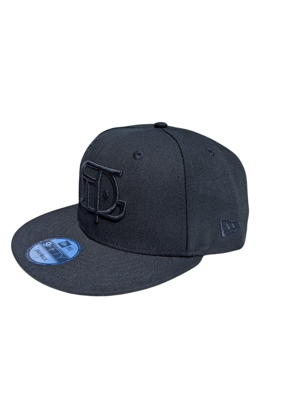 Saints New Era 9Fifty Snapback Blackout Pigseye Cap